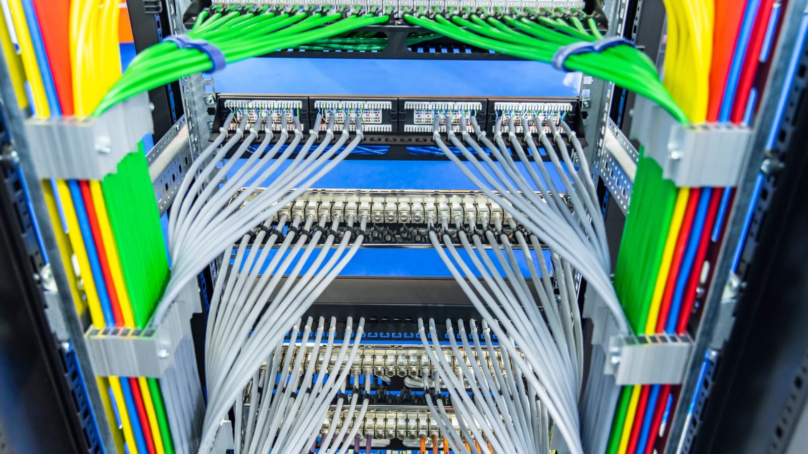 Dive into the world of structured cabling excellence with this vibrant display of meticulously organized cables. Comtek ensures impeccable cable solutions in Des Moines, Ankeny, and throughout Iowa.